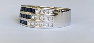 18 karaat witgouden band ring met 0,30 karaat diamanten en saffieren kopen? Bied vanaf 700!
