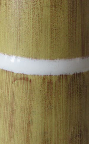 Plateelbakkerij Zuid-Holland - Fifties platelen vaasje met faux bamboe decor Opaal kopen? Bied vanaf 28!