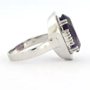 18k gouden ring met amethist en single cut geslepen diamant totaal 0.12ct kopen? Bied vanaf 430!