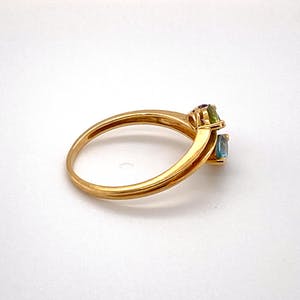 handgemaakte 18kt gouden ring met kleur edelstenen maat 54(17,5) 2,10 gr kopen? Bied vanaf 120!