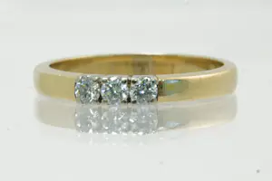 Acheter46 - Tijdloos 14 karaats geelgouden rij ring met diamant ca 0.20 crt briljant? Enchérissez de 220!