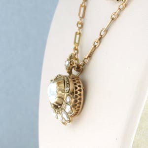 14k rosé gouden collier met hanger bezet met roos geslepen diamant tot. 1,50ct kopen? Bied vanaf 1800!