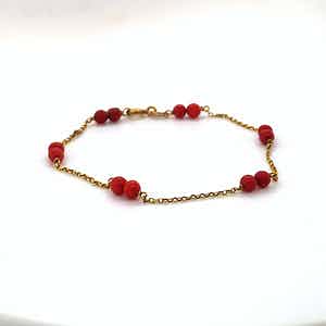 18 kt gouden armband+bloedkoraal, 1,71 gr verkocht voor € 100!