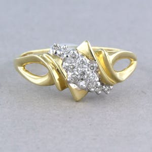 14k bicolor gouden ring bezet met briljant geslepen diamanten tot. 0,13ct kopen? Bied vanaf 1!