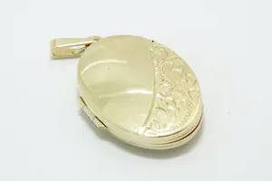51- Fraai bewerkte ovaal vormige 14 Krt geel-gouden medaillon hanger kopen? Bied vanaf 80!