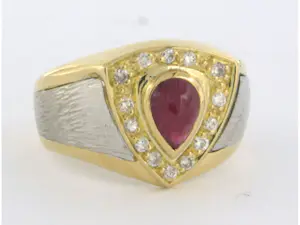 18k bicolour gouden ring bezet met robijn en briljant geslepen diamant 0.21 ct kopen? Bied vanaf 550!