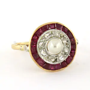18k bicolour gouden ring met parel en erom heen robijn en roos diamanten kopen? Bied vanaf 500!