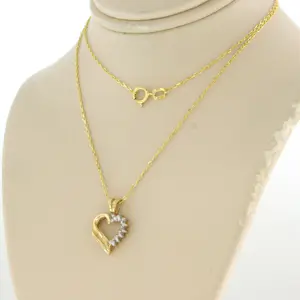 14k gouden collier met hanger met diamant 0.10 ct - 45 cm kopen? Bied vanaf 175!