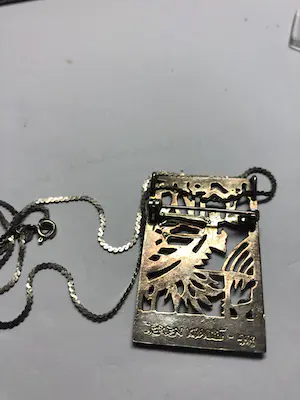 Jeroen Krabbé - zilveren hanger/ broche kopen? Bied vanaf 1!