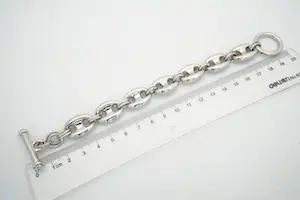 27-  Forse en zo goed als nieuwe 1e gehalte Zilveren armband  koffieboon schakel kopen? Bied vanaf 60!
