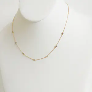 Geelgouden ketting met tanzaniet kopen? Bied vanaf 475!