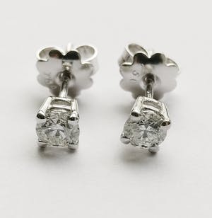 0.62 ct Diamond Solitaire Earrings kopen? Bied vanaf 450!