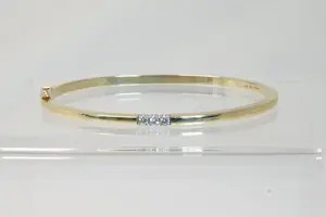 36 - 14 karaats gouden bicolor stijve armband met diamant ca 0.15 crt briljant kopen? Bied vanaf 990!