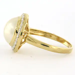 18k bicolour gouden ring met mabee en briljant geslepen diamant tot. 0.40ct kopen? Bied vanaf 675!