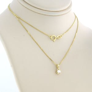 14k gouden collier met hanger bezet met briljant geslepen diamant tot. 0,11ct kopen? Bied vanaf 1!