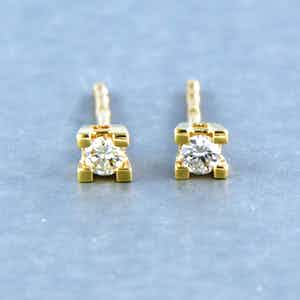 18k gouden solitair oorknoppen bezet met briljant geslepen diamant tot. 0,14ct verkocht voor € 160!