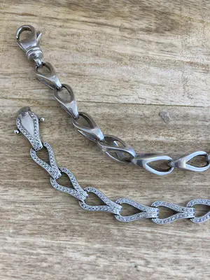 Een Lotje van twee zilveren armbanden met fantasie schakels kopen? Bied vanaf 1!