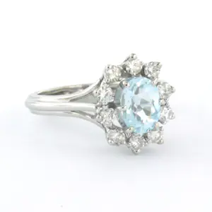 18k gouden ring met topaas en erom heen briljant geslepen diamant tot. 0.40ct kopen? Bied vanaf 660!