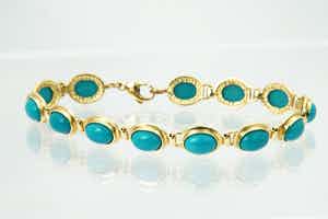 2062- elegante 14 karaats geel-gouden armband gezet met turkoois edelstenen. verkocht voor € 210!