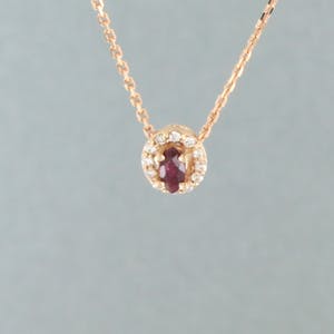 14k gouden collier/hanger met robijn en briljant geslepen diamant tot. 0.10ct kopen? Bied vanaf 200!