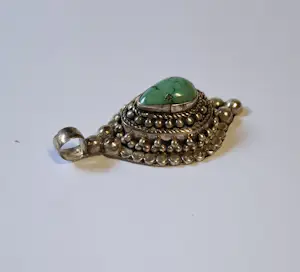 Meer dan 140 jaar Navajo hanger met Turquoise kopen? Bied vanaf 100!