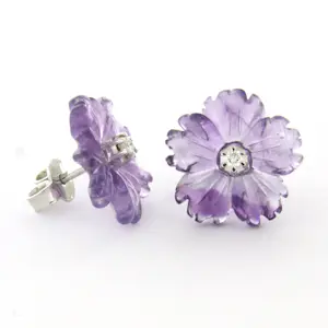 18k gouden oorknoppen met amethist en briljant geslepen diamant tot 0.05ct kopen? Bied vanaf 240!