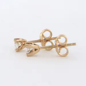 18k rood gouden oorknoppen bezet met briljant geslepen diamant 0.26ct F/G -VS/SI kopen? Bied vanaf 275!