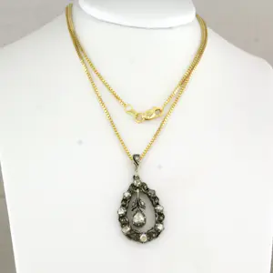 14k gouden collier met goud en zilveren hanger bezet met roos geslepen diamanten kopen? Bied vanaf 510!
