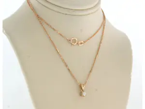 Acheter14k rosé gouden collier met solitair hanger bezet met diamant 0.10 ct - 45 cm? Enchérissez de 175!