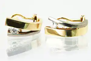 Prachtige set 18 krt bi-color gouden dames oorclips gezet met ca 0.30ct diamant. verkocht voor € 350!