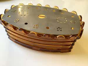 Warmhoudlichtje van geperst glas verkocht voor € 1!