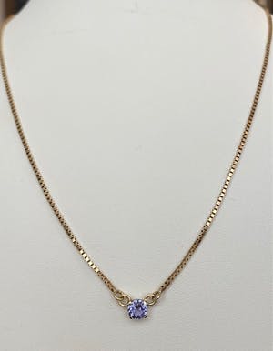 14 karaat geel goud collier met  0.60 ct Tanzaniet hanger kopen? Bied vanaf 220!