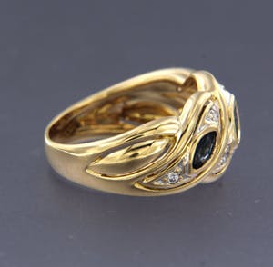 Bicolor gouden ring bezet met saffier en briljant geslepen diamanten kopen? Bied vanaf 240!