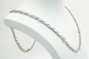 57 -  Lang (70cm) Surinaams 1e geh. zilveren Konings collier met mattenkloppers kopen? Bied vanaf 65!