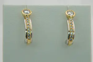 74- Fraaie set bicolor 18krt goud & diamanten oorstekers -ca.0.40ct diamant kopen? Bied vanaf 280!