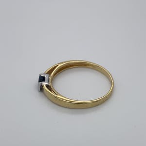 14kt bicolor ring met princess geslepen saffier, mt 55/17,5, 1,65gr kopen? Bied vanaf 90!