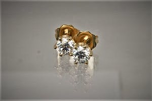 2005- Mooie set 14 krt geel-goud & diamanten (ca.0.70ct) oorstekers kopen? Bied vanaf 730!