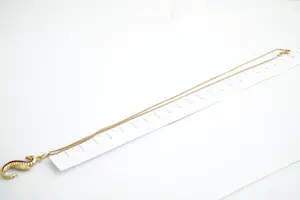 30- Fijn 14 krt  gouden gourmette collier met 18 krt gouden hanger "zeepaardje" kopen? Bied vanaf 170!