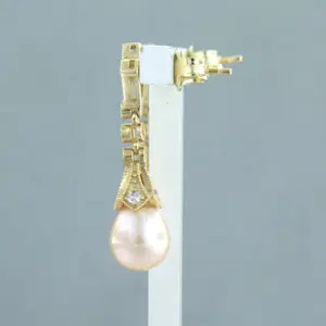 14k geel gouden oorhangers met parel en single cut geslepen diamant 0.34 ct kopen? Bied vanaf 375!