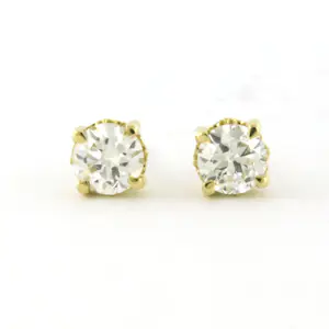 Acheter18k gouden solitair oorknoppen met oud Europees slijpvorm diamant tot. 0.86ct? Enchérissez de 650!