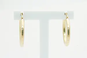 59 - Mooie paar holle 14 karaat geel gouden oorringen kopen? Bied vanaf 120!