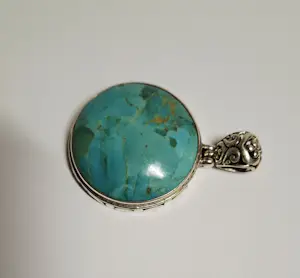 Nieuwe  sierlijk bewerkte hanger Zilver met Natuurlijke Turkoois Edelsteen kopen? Bied vanaf 75!