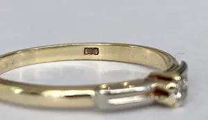 14 kt gouden solitair ring met diamantje kopen? Bied vanaf 100!