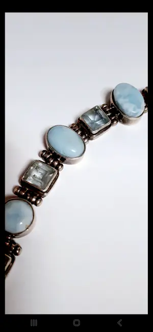 Zilveren Armband bezet met ovale facetgeslepen Aquamarijn en ovale turkoois kopen? Bied vanaf 85!