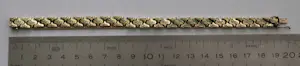 Gouden schakel armband met veiligheids ketting, 14 karaat kopen? Bied vanaf 2100!