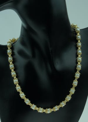 Exclusief 14 karaats gouden design collier met parels kopen? Bied vanaf 2199!