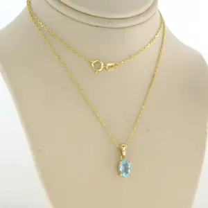 14k geel gouden collier met hanger bezet met blauwe topaas tot. 0,90ct kopen? Bied vanaf 130!