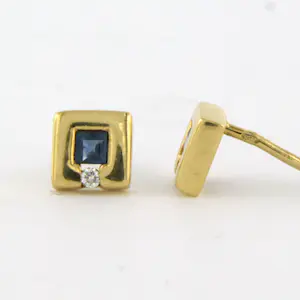 14k geel gouden oorknoppen bezet met saffier en briljant geslepen diamant kopen? Bied vanaf 125!