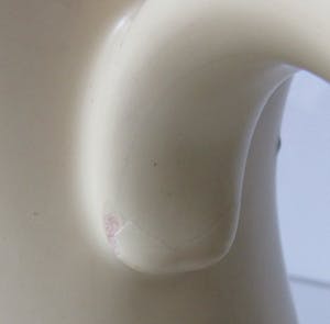 Potterie De Driehoek - Pastel gele melkkan met blauwe polka dots kopen? Bied vanaf 10!