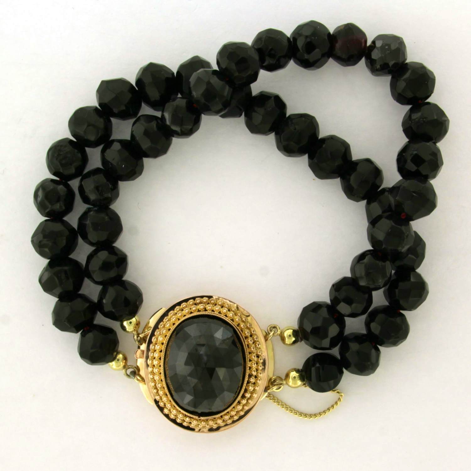 14k gouden slot met granaat aan een twee rijen granaten armband - 44.4 gr kopen? Bied vanaf 450!